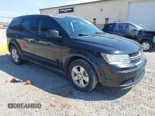2013 Dodge Journey SE with VIN 3C4PDCAB3DT529696, listed as a IAAI auction lot 41885319 with 130,947 mi miles. Bid and sale history available at carsss.com. Image 1.
