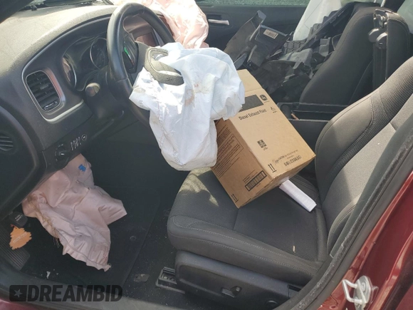 2019 Dodge Charger SXT with VIN 2C3CDXBG9KH728150, listed as a Copart auction lot 50713045 with 148,030 mi miles and Salvage title. Bid and sale history available at DreamBid. Image 7.