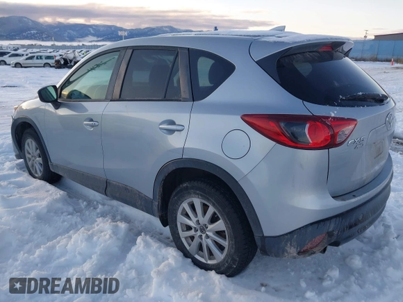 2016 Mazda CX-5 Touring with VIN JM3KE4CY9G0904000, listed as a IAAI auction lot 41186630 with 73,900 mi miles. Bid and sale history available at carsss.com. Image 3.