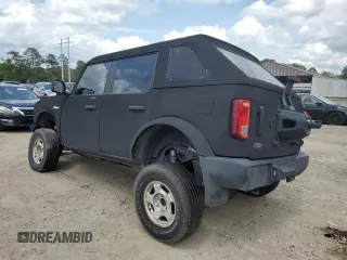 2021 Ford Bronco z VIN 1FMEE5BP4MLA90588, wystawiony jako Copart lot #57164855 z przebiegiem 22 550 mil mil oraz Szkoda całkowita • Salvage title. Historia ofert i sprzedaży dostępna na DreamBid. Obrazek 2.