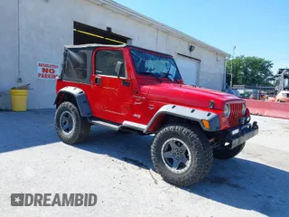 1999 Jeep Wrangler Sport with VIN 1J4FY19S0XP468304, listed as a IAAI auction lot 40038580 with 123,247 mi miles. Bid and sale history available at carsss.com. Image 1.