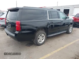 2019 Chevrolet Suburban LT with VIN 1GNSKHKC0KR159583, listed as a IAAI auction lot 41309350 with 196,844 mi miles. Bid and sale history available at carsss.com. Image 4.