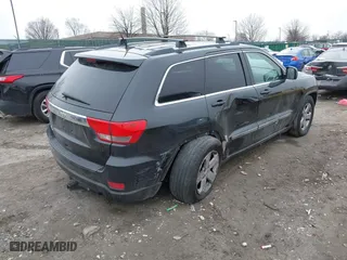 2011 Jeep Grand Cherokee Laredo with VIN 1J4RR4GGXBC511475, listed as a IAAI auction lot 41554620 with 164,361 mi miles. Bid and sale history available at carsss.com. Image 4.