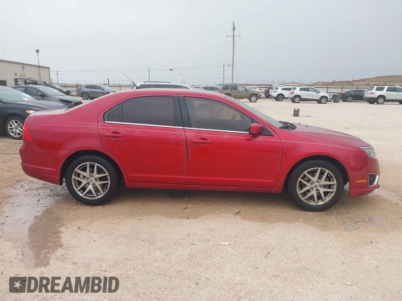 2012 Ford Fusion SEL z VIN 3FAHP0JG2CR165360, wystawiony jako IAAI lot #42064448 z przebiegiem 199 500 mil mil oraz . Historia ofert i sprzedaży dostępna na DreamBid. Obrazek 13.