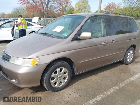 2003 Honda Odyssey EX with VIN 5FNRL186X3B031520, listed as a IAAI auction lot 42095955 with 142,566 mi miles and . Bid and sale history available at DreamBid. Image 2.