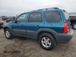 2005 Mazda Tribute i with VIN 4F2YZ02ZX5KM17738, listed as a Copart auction lot 72346384 with 203,245 mi miles and Salvage Title. Bid and sale history available at carsss.com. Image 2.