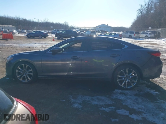 2014 Mazda 6 i Grand Touring with VIN JM1GJ1W67E1137886, listed as a IAAI auction lot 41405112 with 159,879 mi miles and . Bid and sale history available at DreamBid. Image 14.