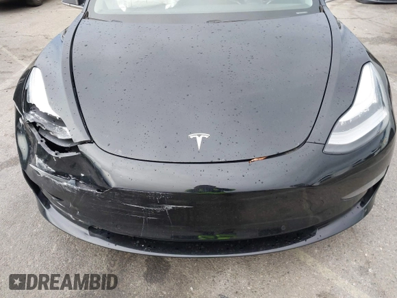 2019 Tesla Model 3 Mid Range with VIN 5YJ3E1EA6KF361808, listed as a IAAI auction lot 41767241 with 96,200 mi miles and . Bid and sale history available at carsss.com. Image 10.