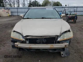 2001 Honda Accord LX z VIN 1HGCG56471A806768, wystawiony jako Copart lot #57066765 z przebiegiem 166 743 mil mil oraz Czysty tytuł • Clean title. Historia ofert i sprzedaży dostępna na DreamBid. Obrazek 5.