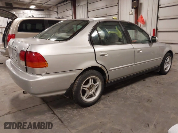 1996 Honda Civic EX with VIN 1HGEJ864XTL053613, listed as a IAAI auction lot 41717526 with 247,022 mi miles. Bid and sale history available at carsss.com. Image 4.