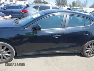 2018 Mazda 3 Touring z VIN 3MZBN1V33JM276803, wystawiony jako IAAI lot #42100422 z przebiegiem 41 802 mil mil oraz . Historia ofert i sprzedaży dostępna na DreamBid. Obrazek 14.