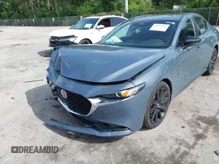 2024 Mazda 3 S Carbon Edition with VIN 3MZBPBCM2RM403824, listed as a IAAI auction lot 42612315 with 8,261 mi miles and . Bid and sale history available at DreamBid. Image 6.