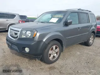 2011 Honda Pilot EX with VIN 5FNYF4H46BB081431, listed as a IAAI auction lot 41849952 with 313,342 mi miles. Bid and sale history available at carsss.com. Image 2.
