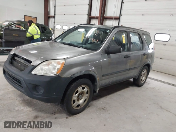 2006 Honda CR-V LX with VIN JHLRD785X6C053853, listed as a IAAI auction lot 42018895 with 246,316 mi miles and . Bid and sale history available at carsss.com. Image 2.