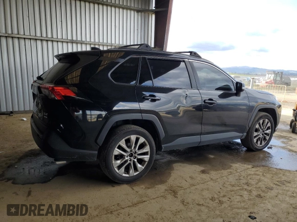 2019 Toyota RAV4 XLE Premium with VIN JTMA1RFV5KD026145, listed as a Copart auction lot 48238125 with 101,443 mi miles and Salvage Title. Bid and sale history available at carsss.com. Image 3.
