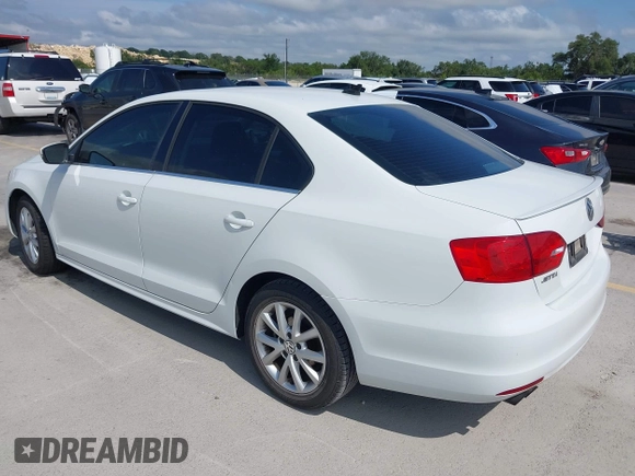 2014 Volkswagen Jetta SE with VIN 3VWD07AJ2EM444256, listed as a IAAI auction lot 42383287 with 99,654 mi miles and . Bid and sale history available at DreamBid. Image 3.