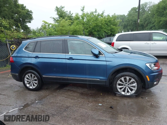 2018 Volkswagen Tiguan SEL with VIN 3VV2B7AX4JM019965, listed as a IAAI auction lot 42395783 with 107,822 mi miles and . Bid and sale history available at DreamBid. Image 13.