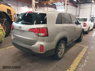 2014 Kia Sorento LX with VIN 5XYKT3A66EG550261, listed as a IAAI auction lot 40922091 with 127,532 mi miles. Bid and sale history available at carsss.com. Image 4.