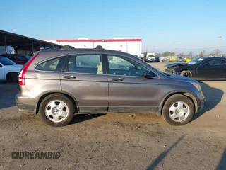 2009 Honda CR-V LX with VIN 5J6RE48389L011915, listed as a IAAI auction lot 41301796 with 214,807 mi miles. Bid and sale history available at carsss.com. Image 14.