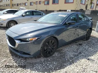 2022 Mazda 3 Carbon Edition z VIN 3MZBPACL3NM318079, wystawiony jako Copart lot #58185015 z przebiegiem 36 299 mil mil oraz Szkoda całkowita • Salvage title. Historia ofert i sprzedaży dostępna na DreamBid. Obrazek 1.