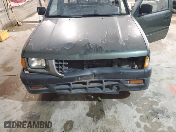 1995 Isuzu Pickup S z VIN JAACL11L0S7211543, wystawiony jako Copart lot #81881194 z przebiegiem 215 222 mil mil oraz Szkoda całkowita • Salvage title. Historia ofert i sprzedaży dostępna na DreamBid. Obrazek 11.