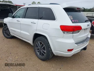 2014 Jeep Grand Cherokee Overland with VIN 1C4RJECG4EC543092, listed as a IAAI auction lot 40981315 with 149,096 mi miles. Bid and sale history available at carsss.com. Image 3.