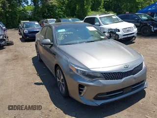 2016 Kia Optima SXL Turbo with VIN 5XXGV4L2XGG019958, listed as a IAAI auction lot 42404254 with 100,694 mi miles and . Bid and sale history available at DreamBid. Image 1.