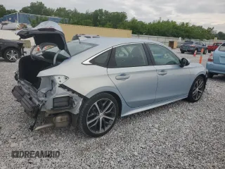 2023 Honda Civic Touring z VIN 2HGFE1F96PH311589, wystawiony jako Copart lot #58594035 z przebiegiem 17 762 mil mil oraz Szkoda całkowita • Salvage title. Historia ofert i sprzedaży dostępna na DreamBid. Obrazek 3.