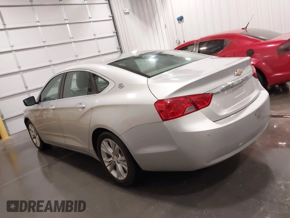 2014 Chevrolet Impala LT with VIN 2G1115SL4E9250806, listed as a IAAI auction lot 42119330 with 98,618 mi miles and . Bid and sale history available at DreamBid. Image 14.