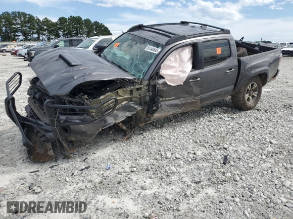 2017 Toyota Tacoma SR5 with VIN 5TFCZ5AN6HX083463, listed as a Copart auction lot 61348895 with 102,927 mi miles and Salvage title. Bid and sale history available at DreamBid. Image 1.