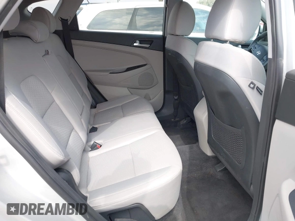 2019 Hyundai Tucson Value with VIN KM8J3CA46KU962082, listed as a IAAI auction lot 42160288 with 92,887 mi miles and . Bid and sale history available at DreamBid. Image 8.