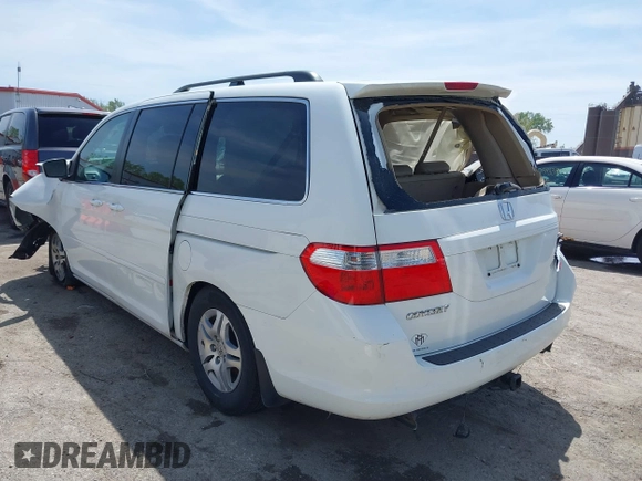 2007 Honda Odyssey EX-L with VIN 5FNRL38617B141003, listed as a IAAI auction lot 39232543 with 195,096 mi miles and . Bid and sale history available at DreamBid. Image 3.