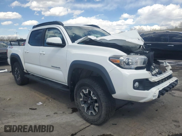 2018 Toyota Tacoma SR with VIN 5TFCZ5AN3JX128204, listed as a Copart auction lot 53970865 with 76,986 mi miles and Salvage Title. Bid and sale history available at DreamBid. Image 4.