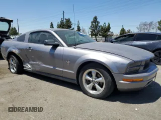 2007 Ford Mustang Deluxe with VIN 1ZVFT80N775319949, listed as a Copart auction lot 57623665 with 128,972 mi miles and Salvage title. Bid and sale history available at DreamBid. Image 4.