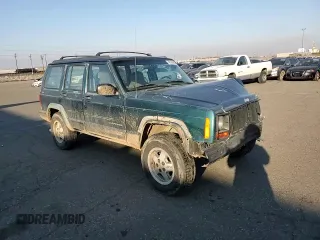 1997 Jeep Cherokee SE with VIN 1J4FJ28S1VL582070, listed as a Copart auction lot 43194435 with 192,534 mi miles and Salvage Title. Bid and sale history available at carsss.com. Image 10.
