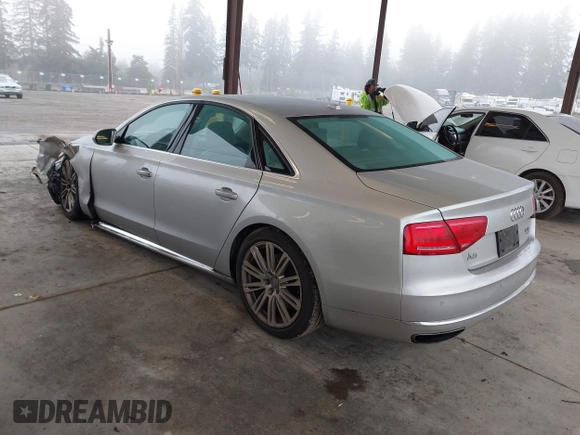 2013 Audi A8 4.0L с VIN WAUA2AFD5DN017770, выставлен на аукционе IAAI как лот 41255625 с пробегом 115 993 миль миль и . История ставок и продаж доступна на DreamBid. Изображение 3.