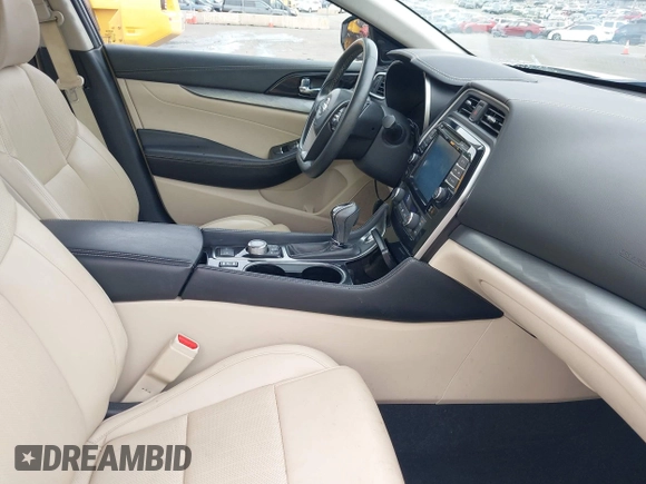 2016 Nissan Maxima Platinum with VIN 1N4AA6AP9GC403960, listed as a IAAI auction lot 42781654 with 19,699 mi miles and . Bid and sale history available at DreamBid. Image 5.