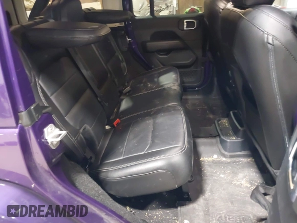 2023 Jeep Wrangler Sahara with VIN 1C4HJXEN9PW560958, listed as a IAAI auction lot 41980179 with 35,975 mi miles and . Bid and sale history available at DreamBid. Image 8.
