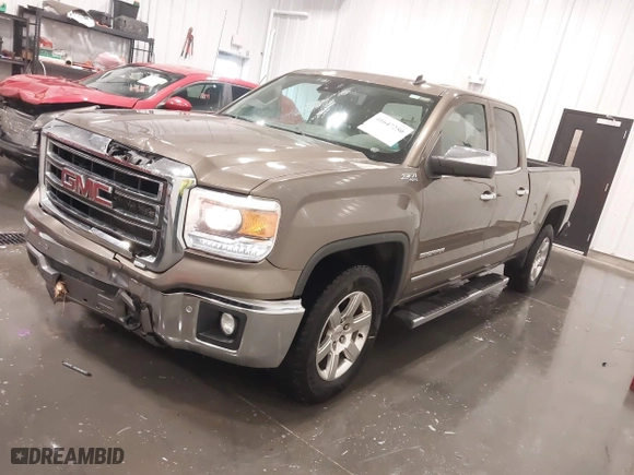 2014 GMC Sierra 1500 SLT with VIN 1GTV2VEC9EZ153530, listed as a IAAI auction lot 41647250 with 124,171 mi miles. Bid and sale history available at carsss.com. Image 2.