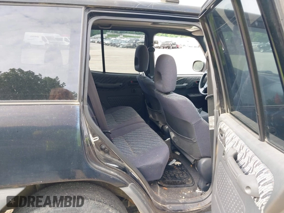 1999 Toyota RAV4 with VIN JT3HP10V2X7120498, listed as a IAAI auction lot 42409235 with 215,769 mi miles and . Bid and sale history available at DreamBid. Image 8.