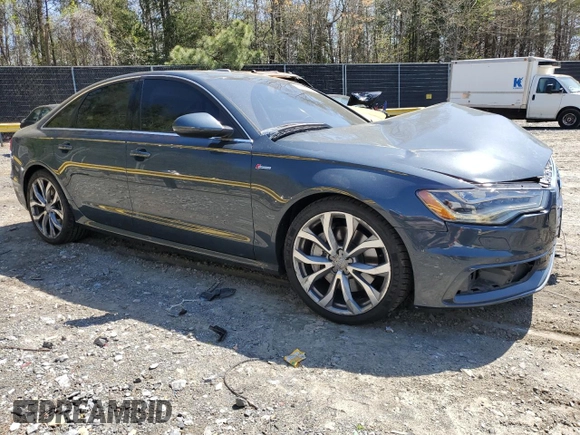 2014 Audi A6 Prestige z VIN WAUHGAFCXEN115962, wystawiony jako Copart lot #52228395 z przebiegiem 134 622 mil mil oraz Szkoda całkowita • Salvage title. Historia ofert i sprzedaży dostępna na DreamBid. Obrazek 4.
