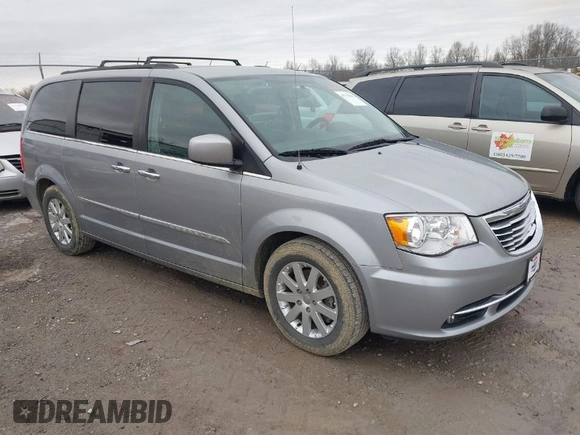2015 Chrysler Town & Country Touring with VIN 2C4RC1BG4FR602557, listed as a IAAI auction lot 41715004 with 164,030 mi miles. Bid and sale history available at carsss.com. Image 1.