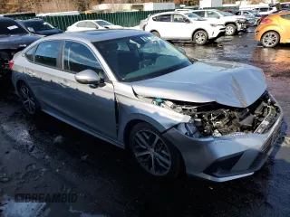 2024 Honda Civic Sedan Touring with VIN 2HGFE1F95RH325566, listed as a Copart auction lot 44560265 with 7,127 mi miles and Salvage Title. Bid and sale history available at carsss.com. Image 4.