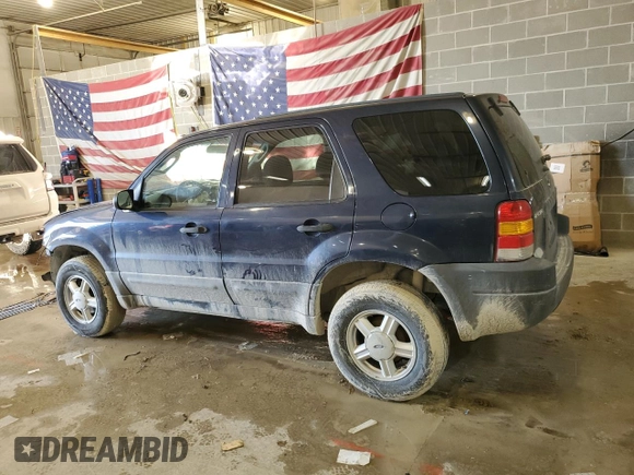2004 Ford Escape XLS with VIN 1FMYU92154KA14600, listed as a Copart auction lot 83101474 with 305,444 mi miles and Salvage Title. Bid and sale history available at DreamBid. Image 2.