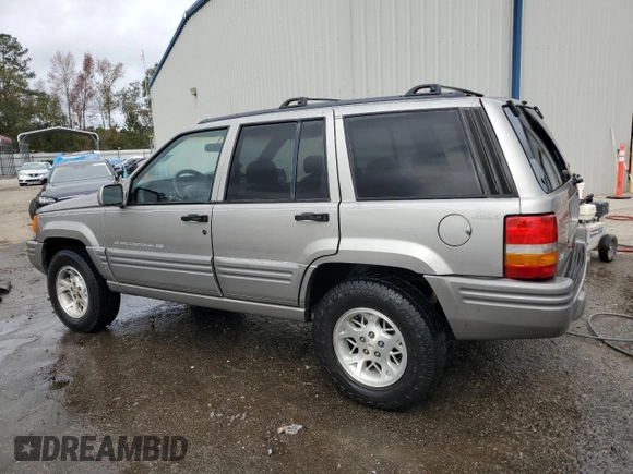 1997 Jeep Grand Cherokee Limited with VIN 1J4GZ78Y0VC682949, listed as a Copart auction lot 82152424 with 194,576 mi miles and Salvage Title. Bid and sale history available at carsss.com. Image 2.
