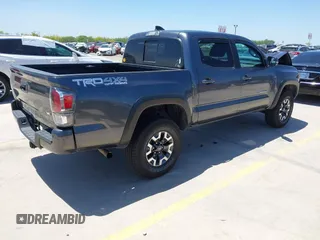 2021 Toyota Tacoma SR с VIN 3TMCZ5AN7MM399387, выставлен на аукционе IAAI как лот 42063038 с пробегом 77 894 миль миль и . История ставок и продаж доступна на DreamBid. Изображение 4.