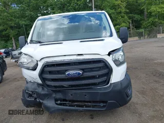 2020 Ford Transit Cargo z VIN 1FTBR2Y80LKB22354, wystawiony jako IAAI lot #42347579 z przebiegiem 64 513 mil mil oraz . Historia ofert i sprzedaży dostępna na DreamBid. Obrazek 12.