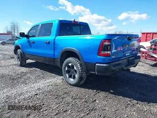 2022 Ram 1500 Rebel z VIN 1C6SRFLT0NN177124, wystawiony jako IAAI lot #41575076 z przebiegiem 40 065 mil mil oraz . Historia ofert i sprzedaży dostępna na DreamBid. Obrazek 3.