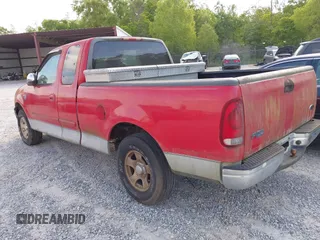 2002 Ford F-150 XL with VIN 1FTRX17W12NA07936, listed as a IAAI auction lot 42068598 with 1 mi miles. Bid and sale history available at carsss.com. Image 3.