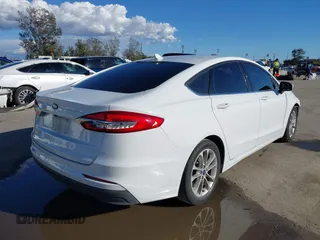 2020 Ford Fusion SE with VIN 3FA6P0H70LR155746, listed as a IAAI auction lot 41755768 with 74,220 mi miles. Bid and sale history available at carsss.com. Image 4.